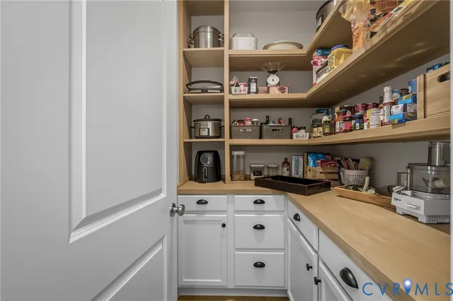 a kitchen with stainless steel appliances a stove and a refrigerator