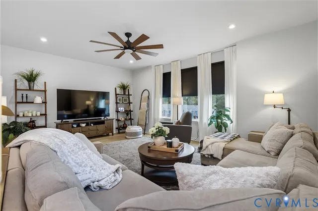 a view of living room and wooden floor