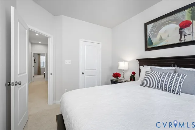 a workspace room with furniture and a window