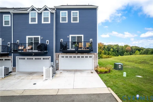 a large building with a yard in front of it