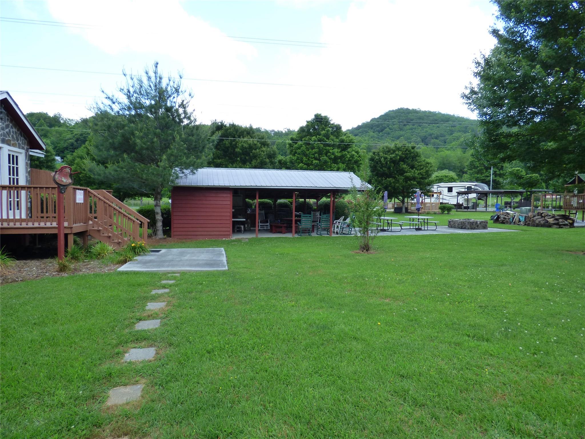 50 Timber Leaf Drive, Unit 12 Sylva, NC 28779 - Photo 3 of 14 a front view of a house with garden