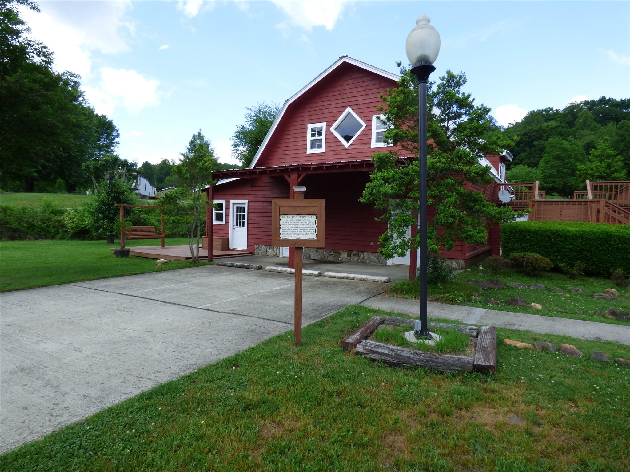50 Timber Leaf Drive, Unit 12 Sylva, NC 28779 - Photo 4 of 14 a front view of a house with garden