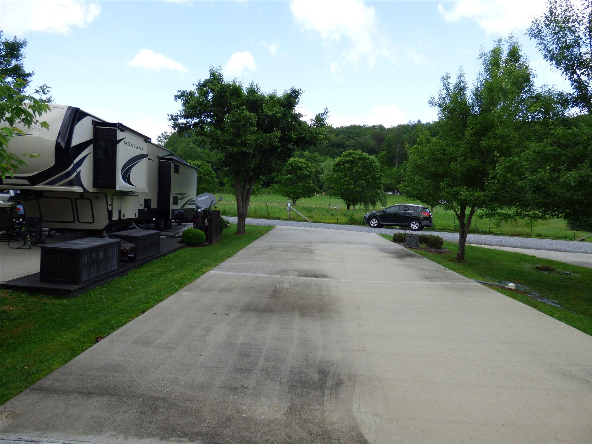 50 Timber Leaf Drive, Unit 12 Sylva, NC 28779 - Photo 10 of 14 a view of a park with large trees