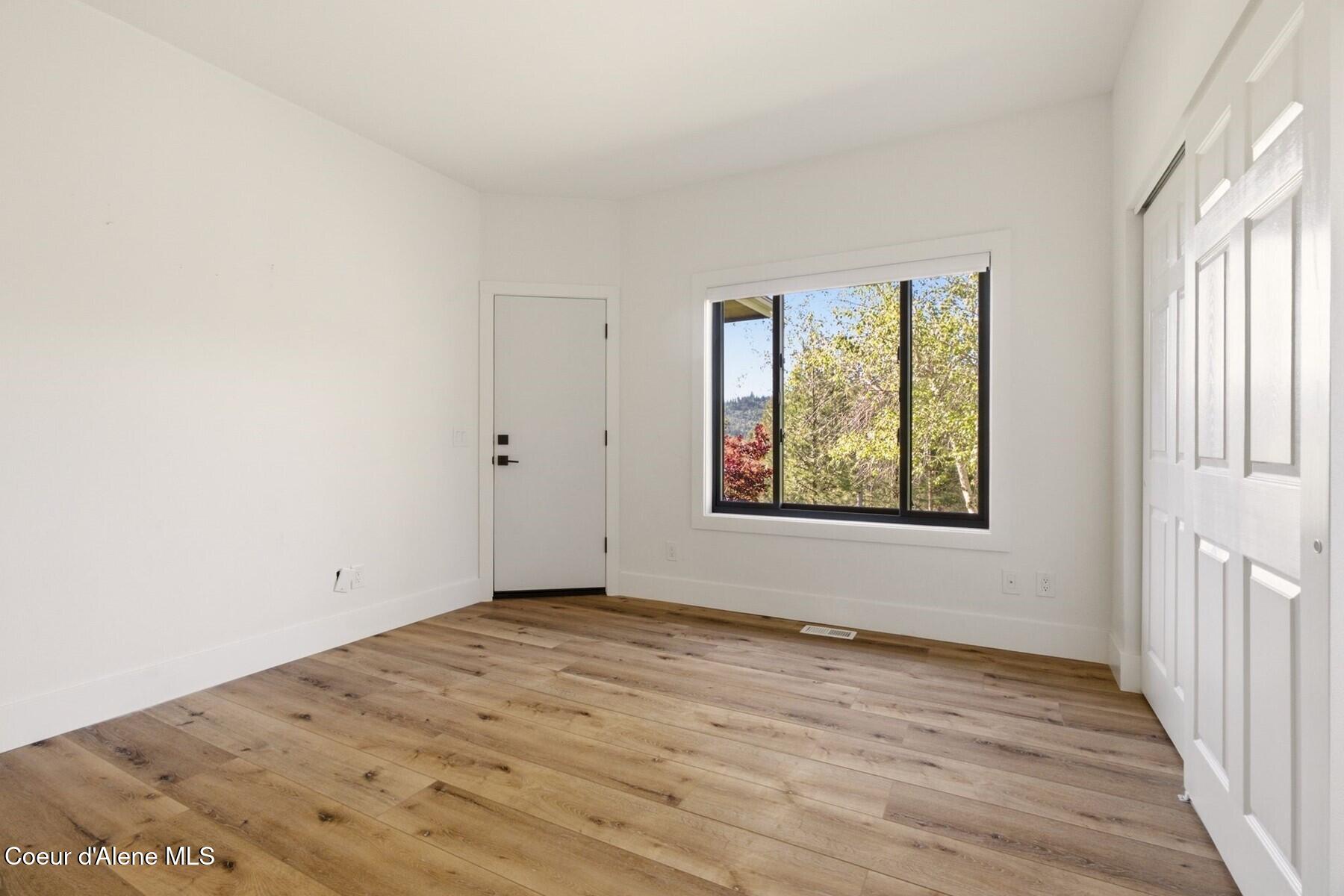 10988 West Thompson Road Coeur D'Alene, ID 83814 - Photo 35 of 71 Main Floor Guest Bedroom