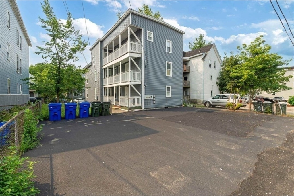 320 Cedar Street, Unit 2 Manchester, NH 03103 - Photo 5 of 5 a view of street with large buildings