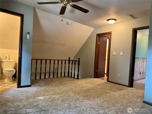 a view of a livingroom with a staircase