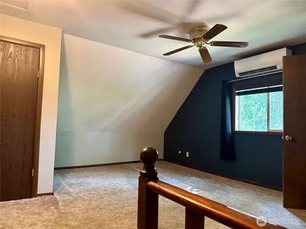 a view of a livingroom with a ceiling fan