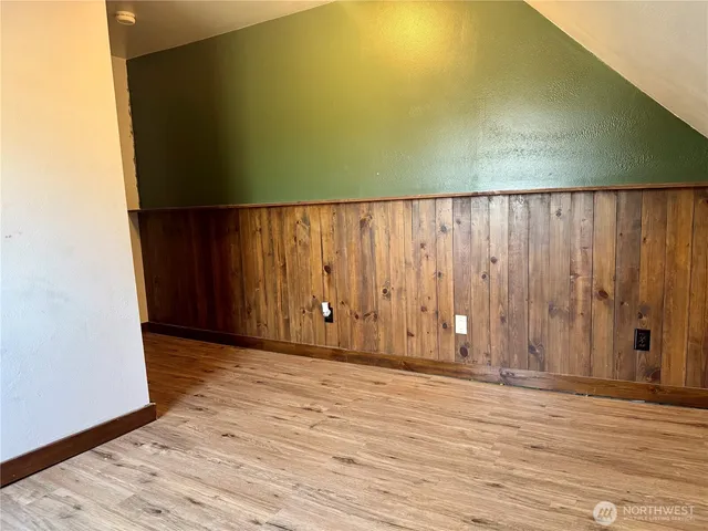 a view of wooden floor in a bathroom