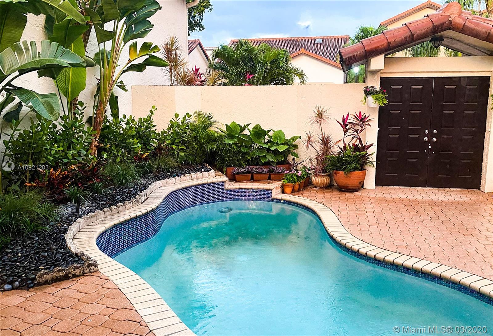 23148 Via Stel Boca Raton, FL 33433 - Photo 3 of 24 COURTYARD - POOL