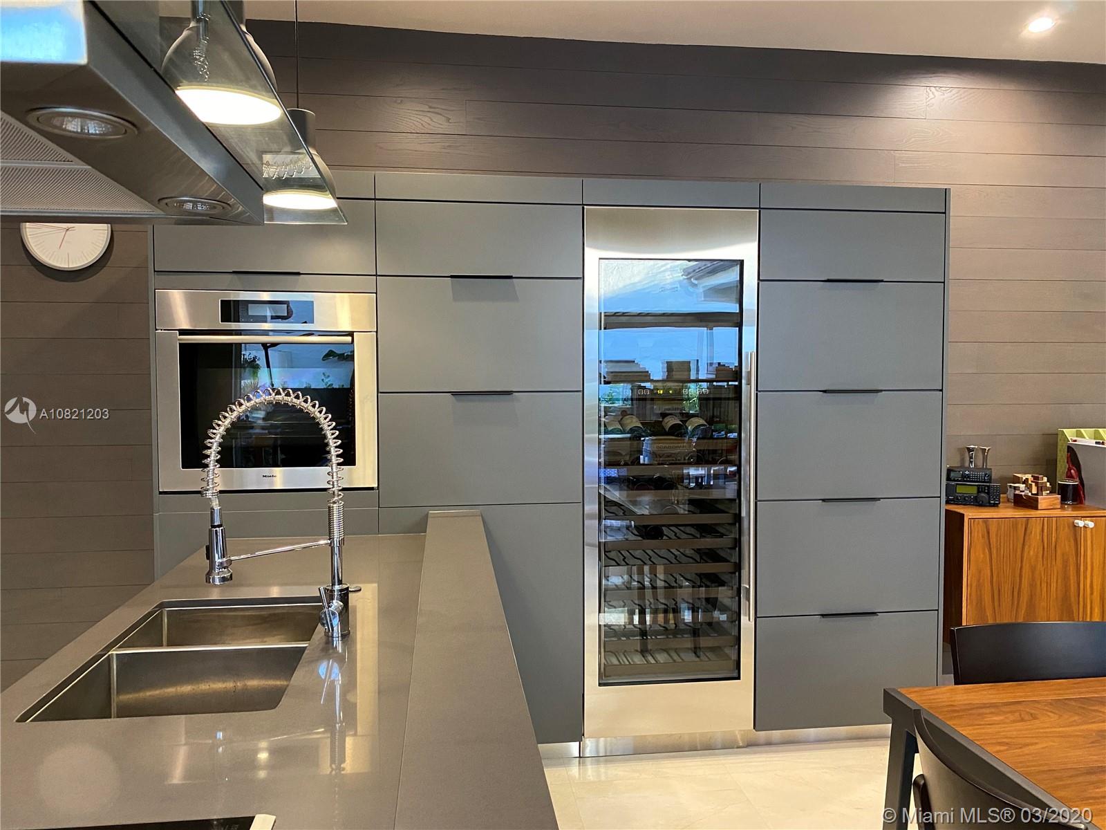 23148 Via Stel Boca Raton, FL 33433 - Photo 8 of 24 KITCHEN - WINE STORAGE