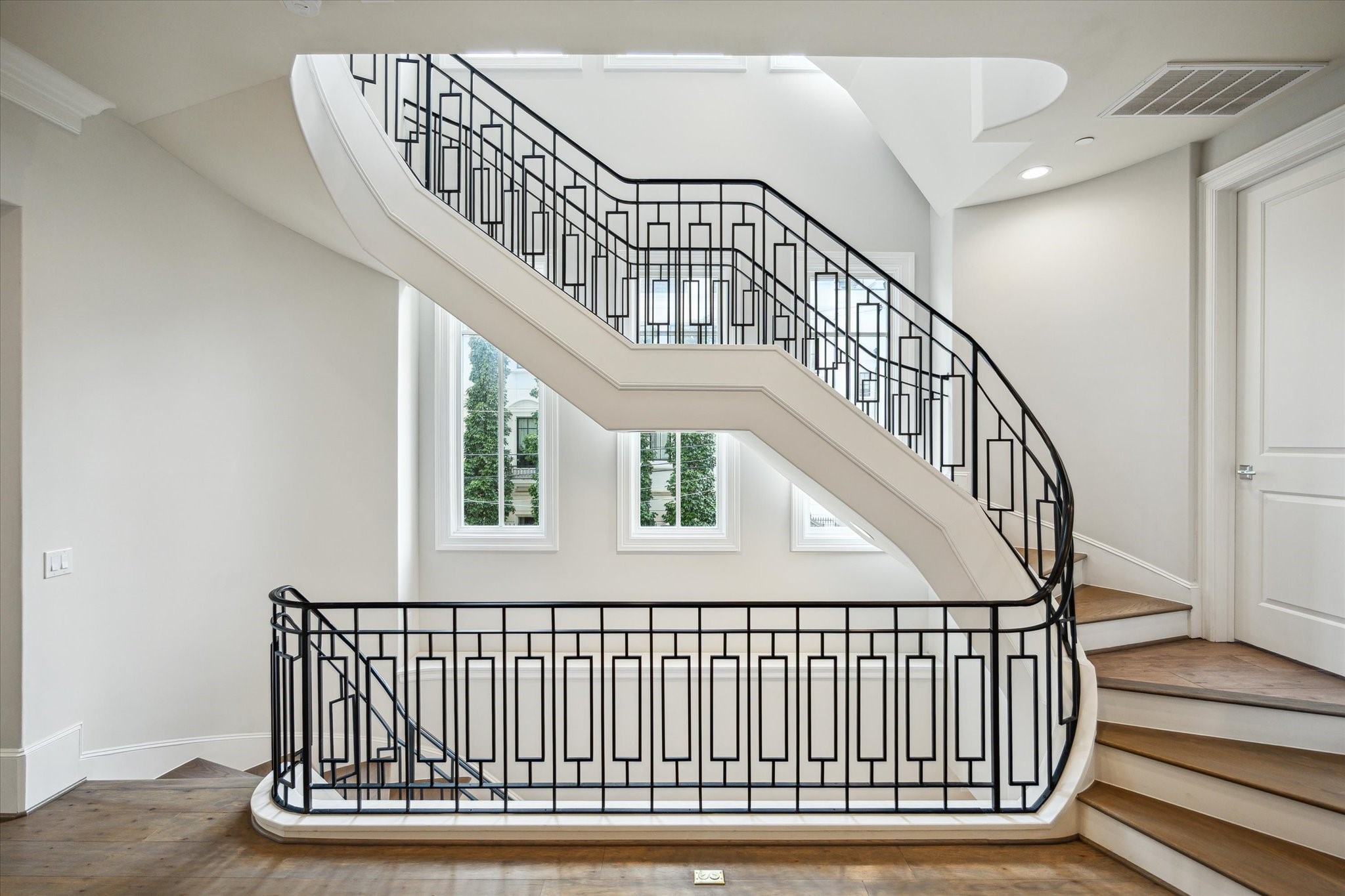 2336 Welch Street Houston, TX 77019 - Photo 13 of 39 a view of entryway with staircase