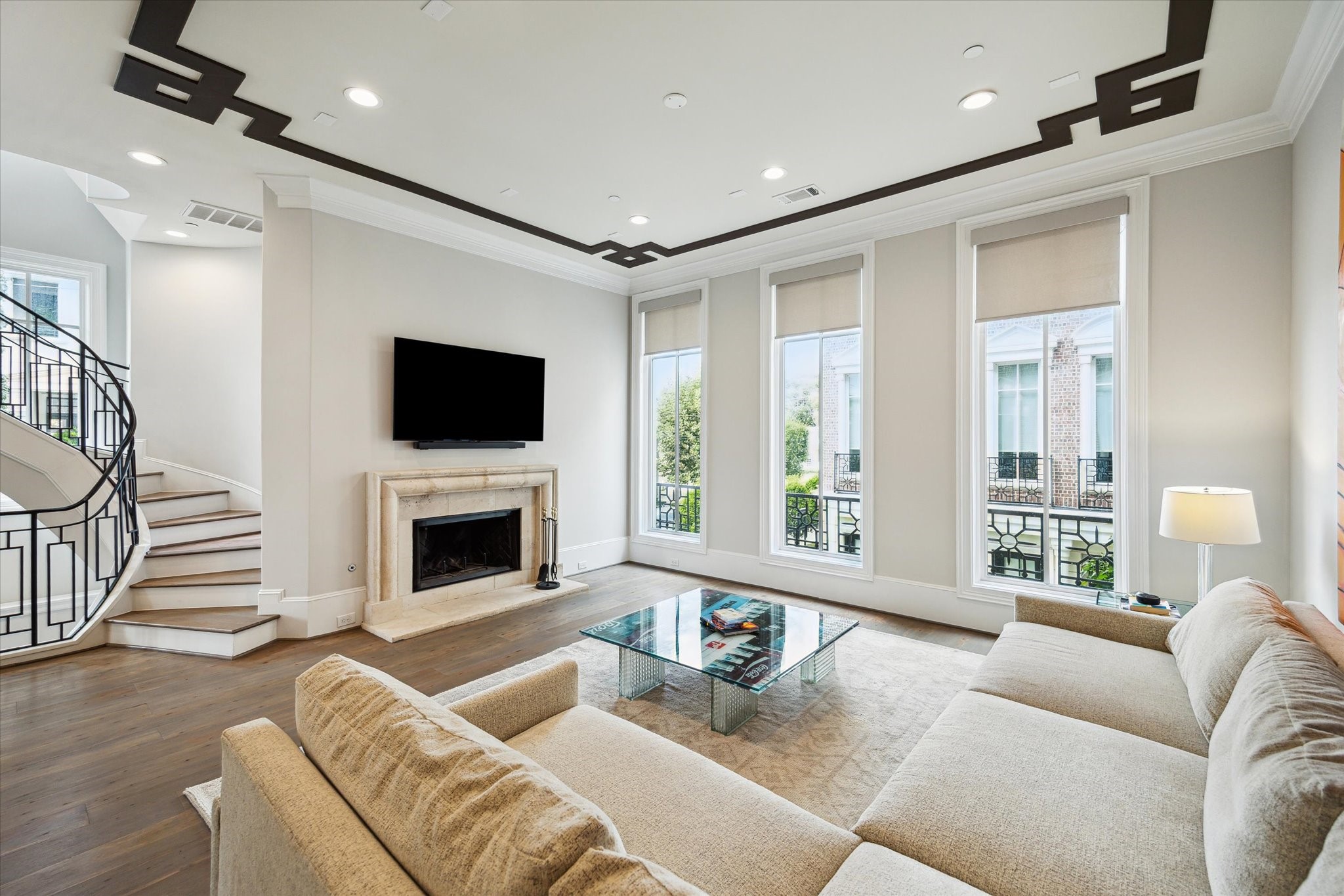 2336 Welch Street Houston, TX 77019 - Photo 18 of 39 a living room with furniture and a fireplace