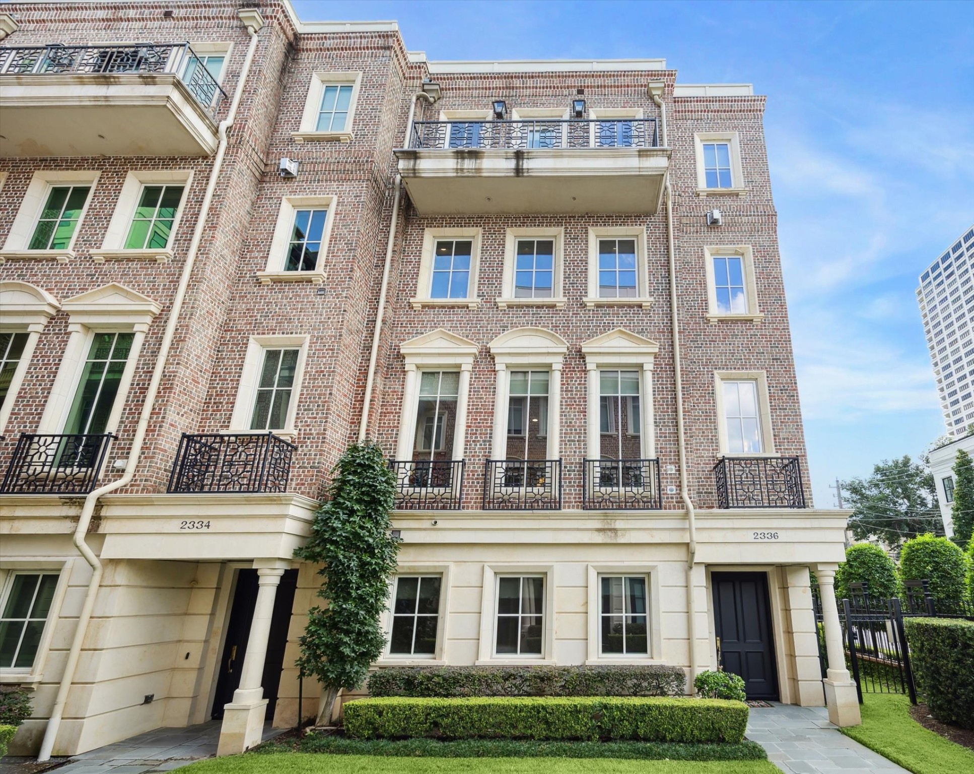 2336 Welch Street Houston, TX 77019 - Photo 2 of 39 a front view of a multi story building