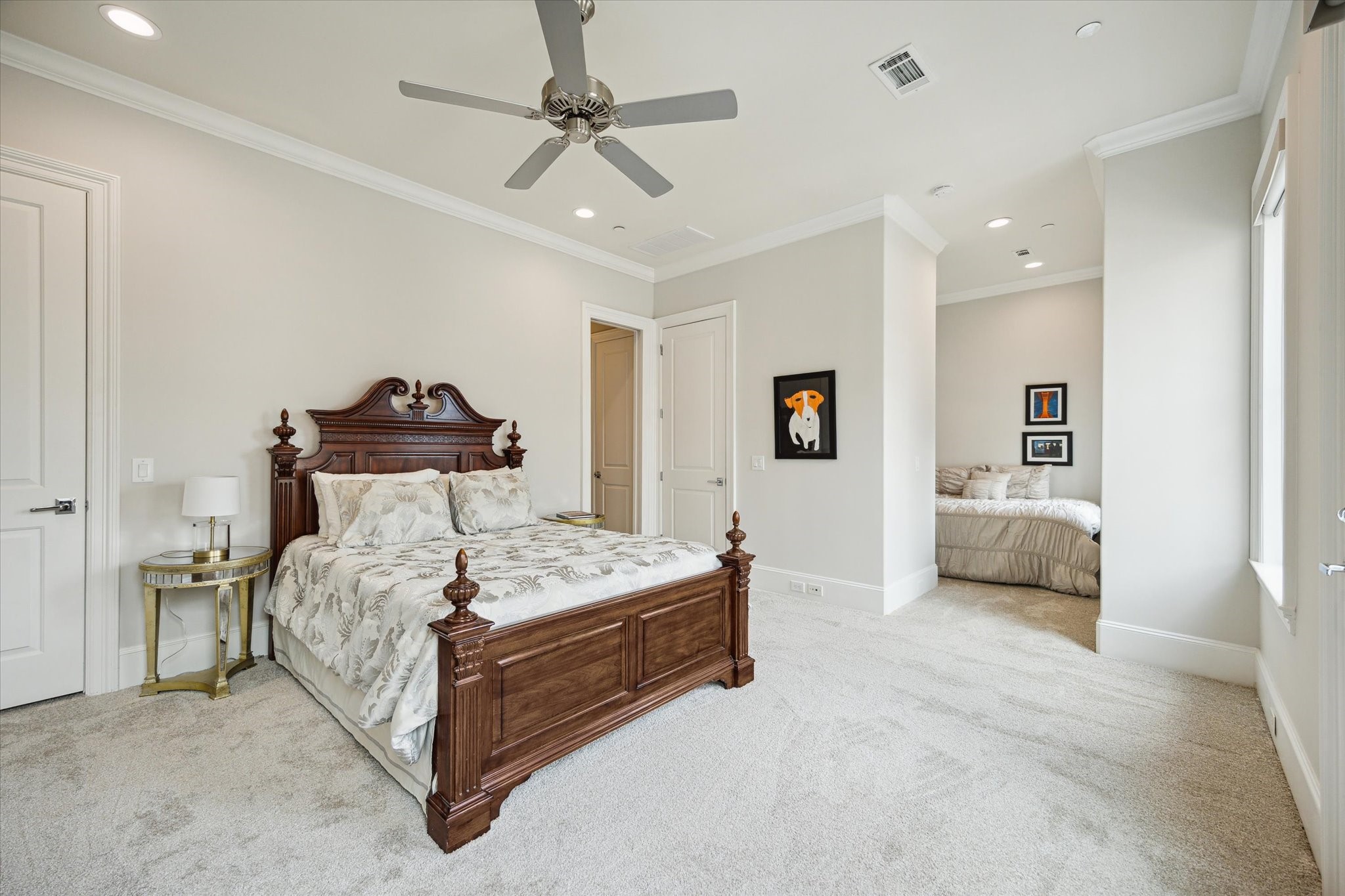 2336 Welch Street Houston, TX 77019 - Photo 31 of 39 a bedroom with a bed and a couch