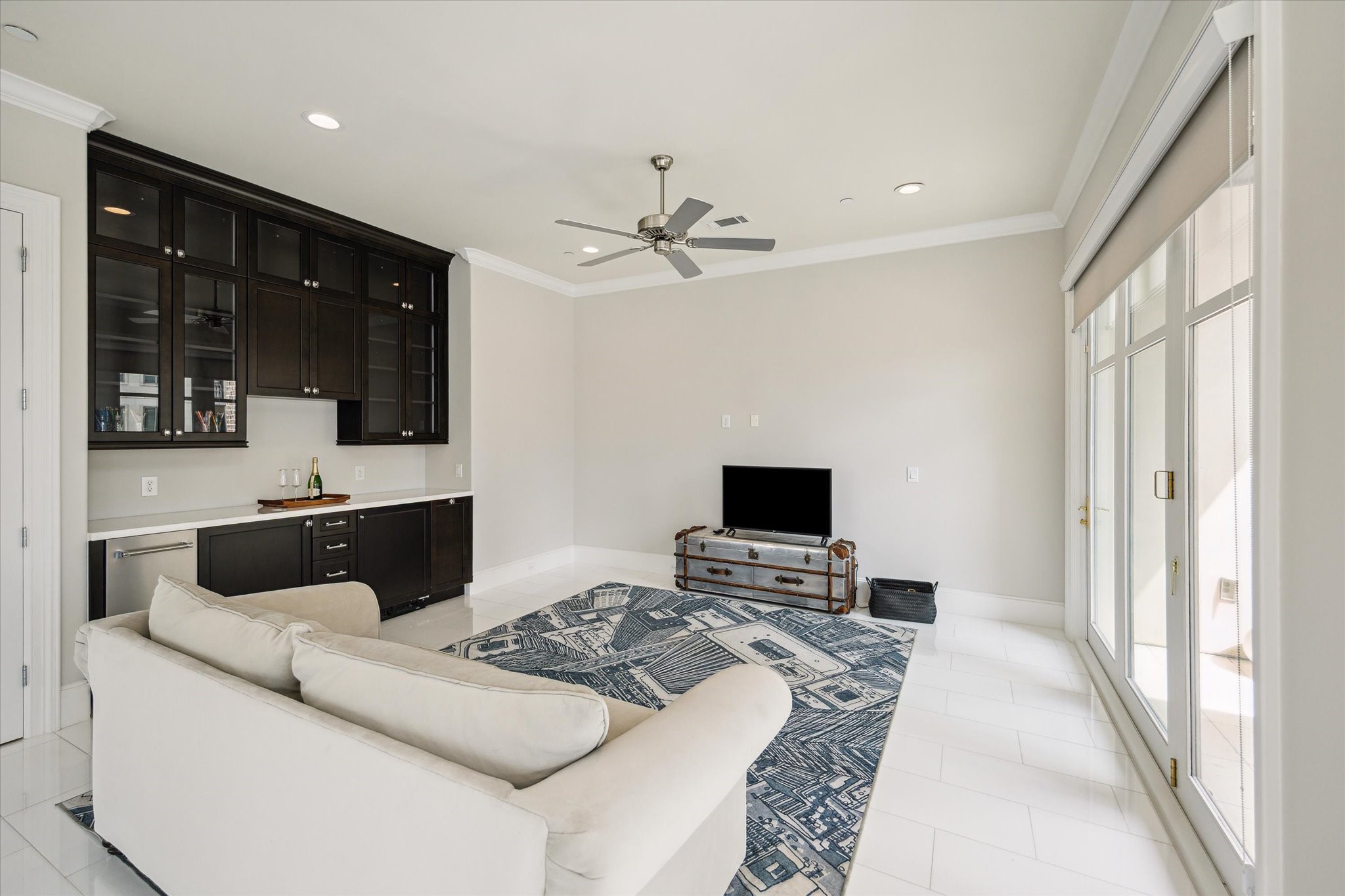 2336 Welch Street Houston, TX 77019 - Photo 34 of 39 a living room with a bed furniture and a large window