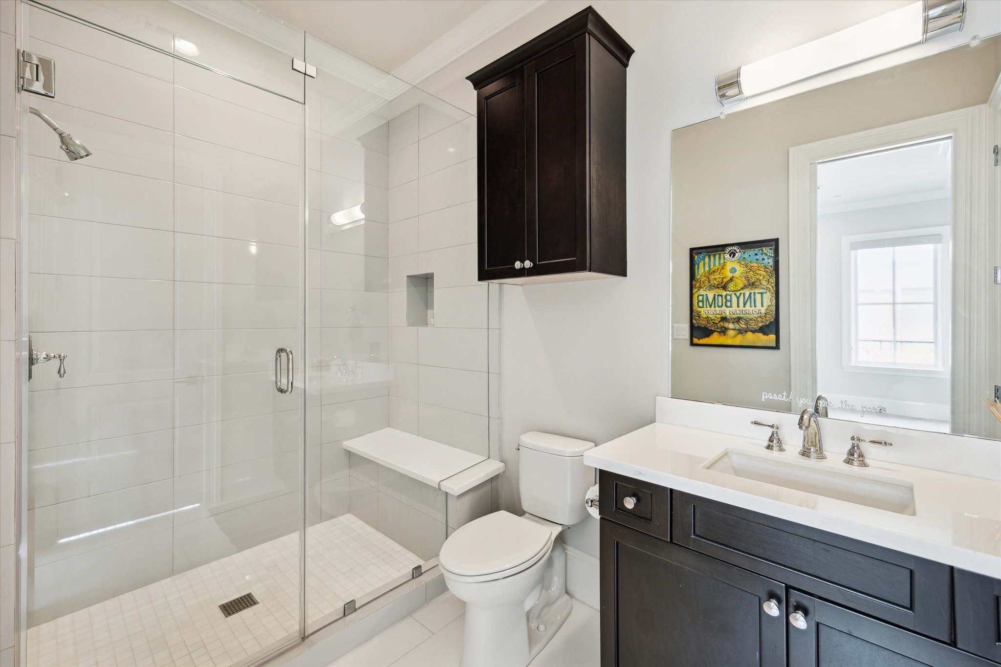 2336 Welch Street Houston, TX 77019 - Photo 38 of 39 a bathroom with a sink toilet and shower