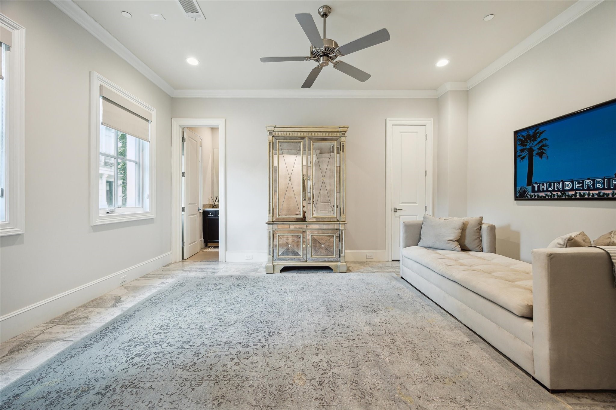 2336 Welch Street Houston, TX 77019 - Photo 9 of 39 a living room with furniture and a ceiling fan