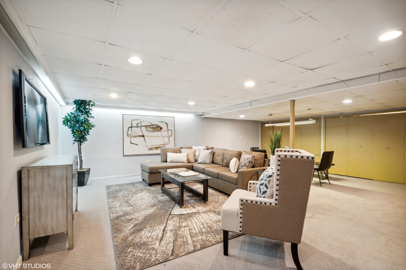 1734 Birch Road Northbrook, IL 60062 - Photo 18 of 27 a living room with furniture and a flat screen tv