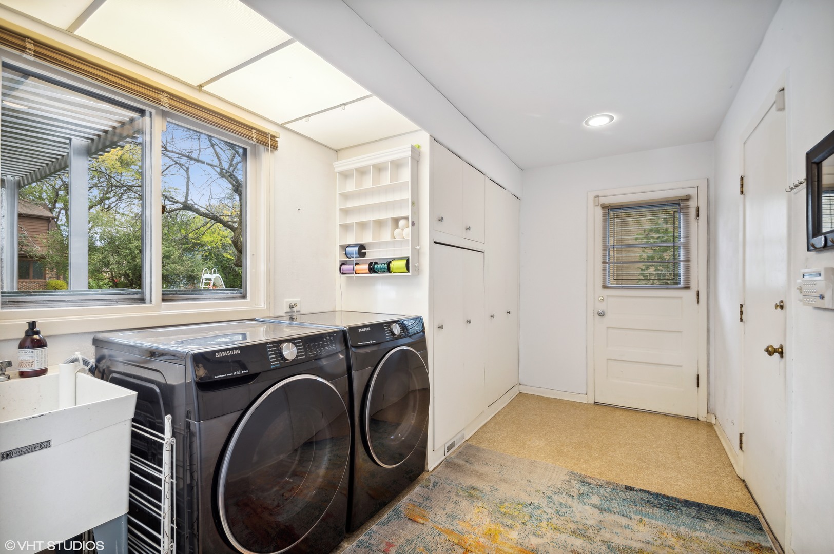 1734 Birch Road Northbrook, IL 60062 - Photo 19 of 27 a utility room with sink dryer and washer