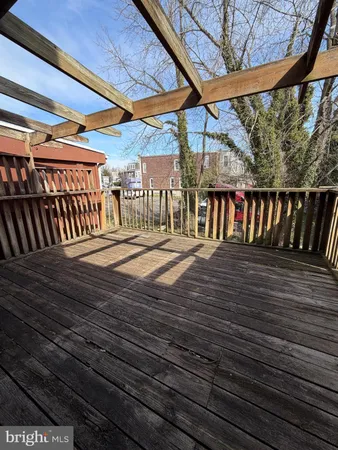 a balcony with wooden floor