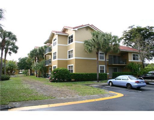 8891 Wiles Road, Unit 206 Coral Springs, FL 33067 - Photo 1 of 7 Primary Photo