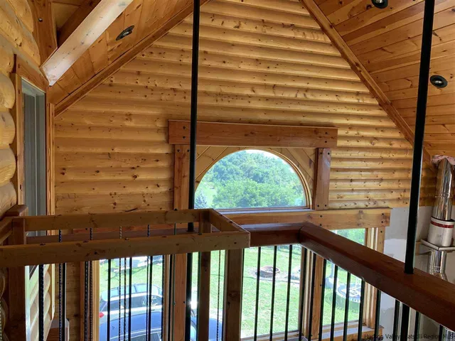 a view of a balcony with an outdoor space