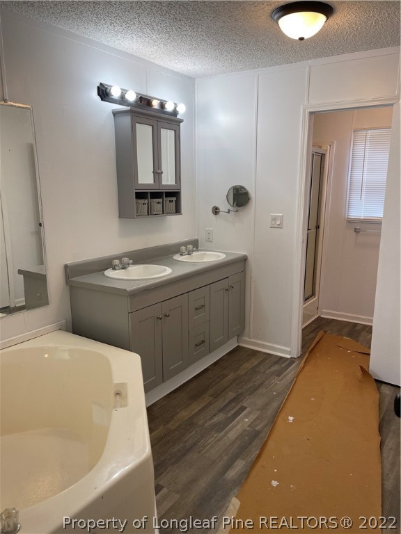 3915 Alamac Road Lumberton, NC 28358 - Photo 13 of 18 a bathroom with a tub sink and mirror