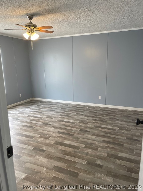 3915 Alamac Road Lumberton, NC 28358 - Photo 16 of 18 a view of a room with a ceiling fan