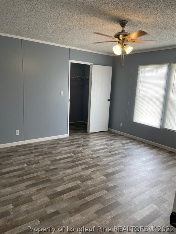 3915 Alamac Road Lumberton, NC 28358 - Photo 17 of 18 a view of an empty room with window and chandelier fan