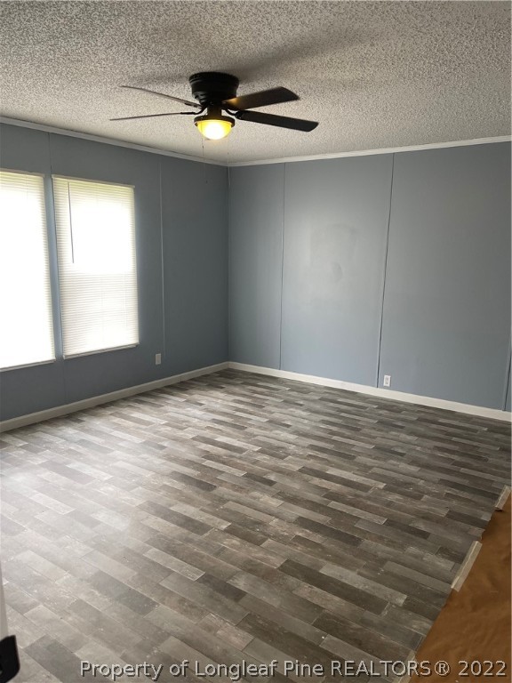 3915 Alamac Road Lumberton, NC 28358 - Photo 7 of 18 a view of an empty room with a window