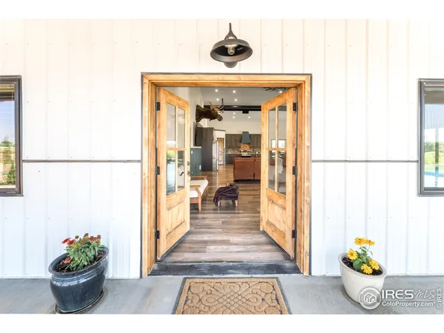 a view of a hallway to a house
