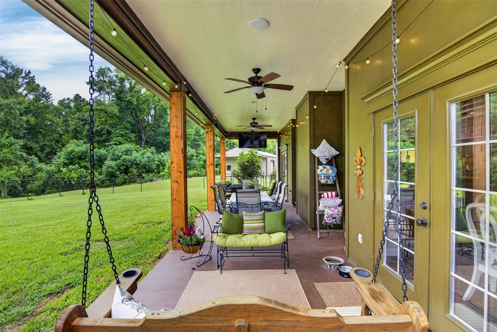 11868 Timber Ridge Drive Keithville, LA 71047 - Photo 31 of 37 Covered patio featuring an outdoor swing, ceiling fans, recessed lighting, and french doors