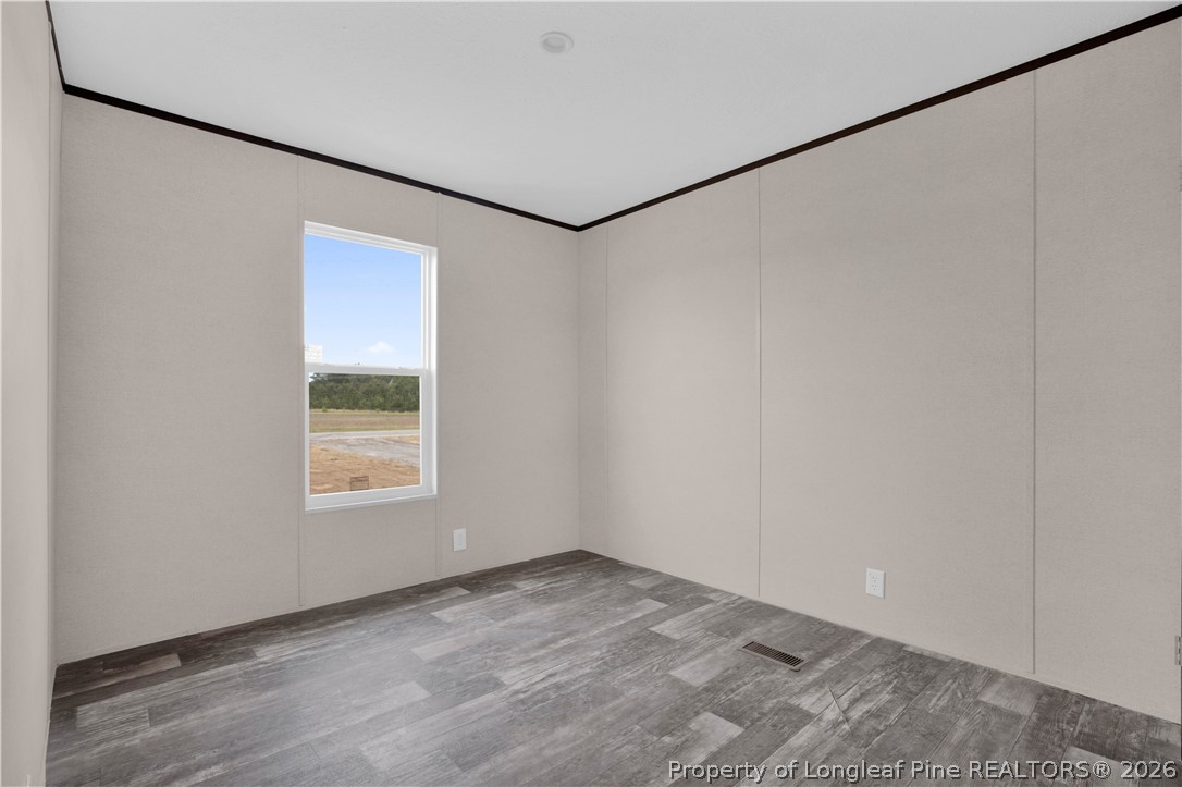 6309 Deep Branch Road Pembroke, NC 28372 - Photo 21 of 32 a view of an empty room with a window