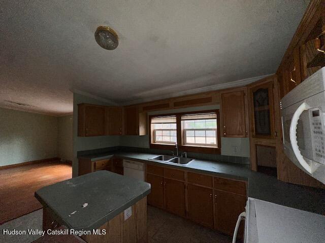 70 Old Field Road New Baltimore, NY 12042 - Photo 3 of 18 a kitchen with a sink cabinets and window