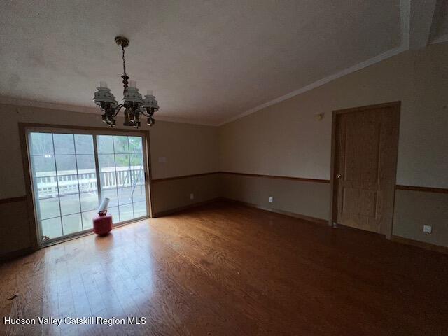 70 Old Field Road New Baltimore, NY 12042 - Photo 5 of 18 an empty room with wooden floor and windows