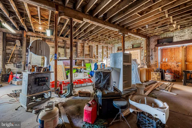 an aerial view of a houses with outdoor space