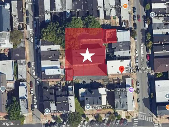 a front view of a building with a street