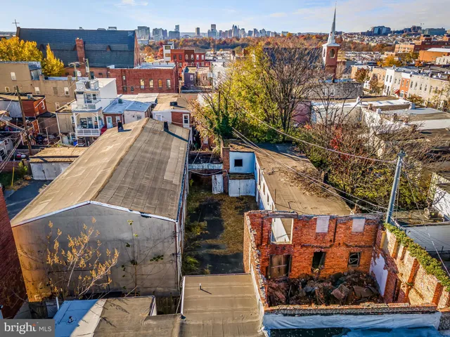 a view of a house with a street