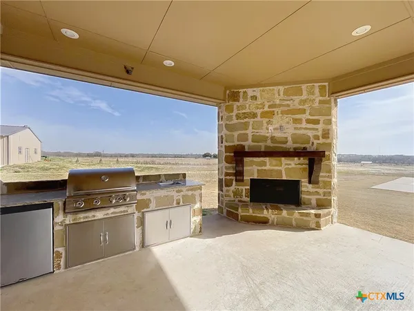 a kitchen with a stove and a microwave