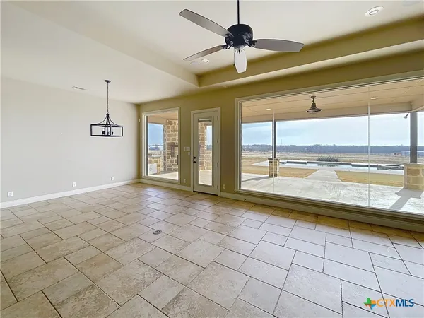 a view of an empty room and window