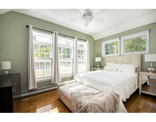 65 Paul Road Hanover, MA 02339 - Photo 41 of 42 a bedroom with a bed and a large window