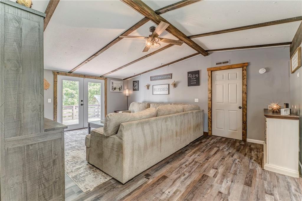 135 Little Creek Lane Resaca, GA 30735 - Photo 28 of 49 a bed room with a bed and a window