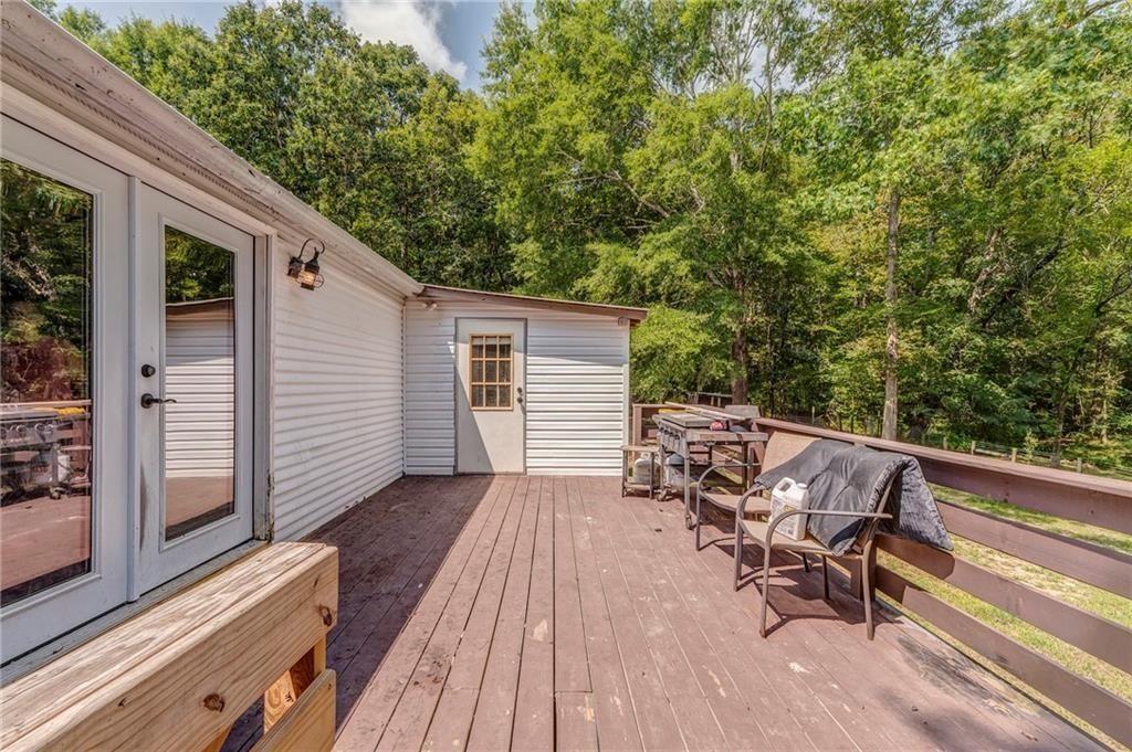135 Little Creek Lane Resaca, GA 30735 - Photo 44 of 49 a view of deck with chairs and wooden floor