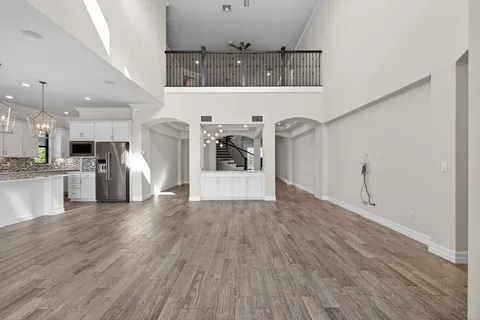 a view of a hallway view with staircase