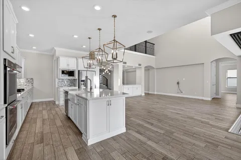 a view of a kitchen with a sink