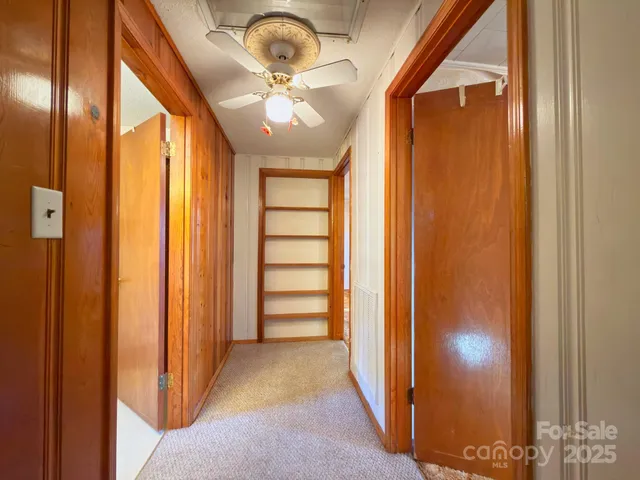 a view of a chairs and table in a room