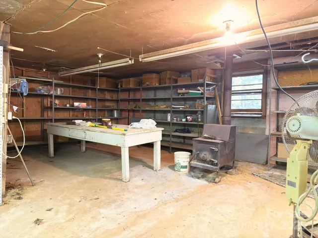 a view of a yard with large trees