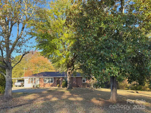 a view of a outdoor space and trees all around