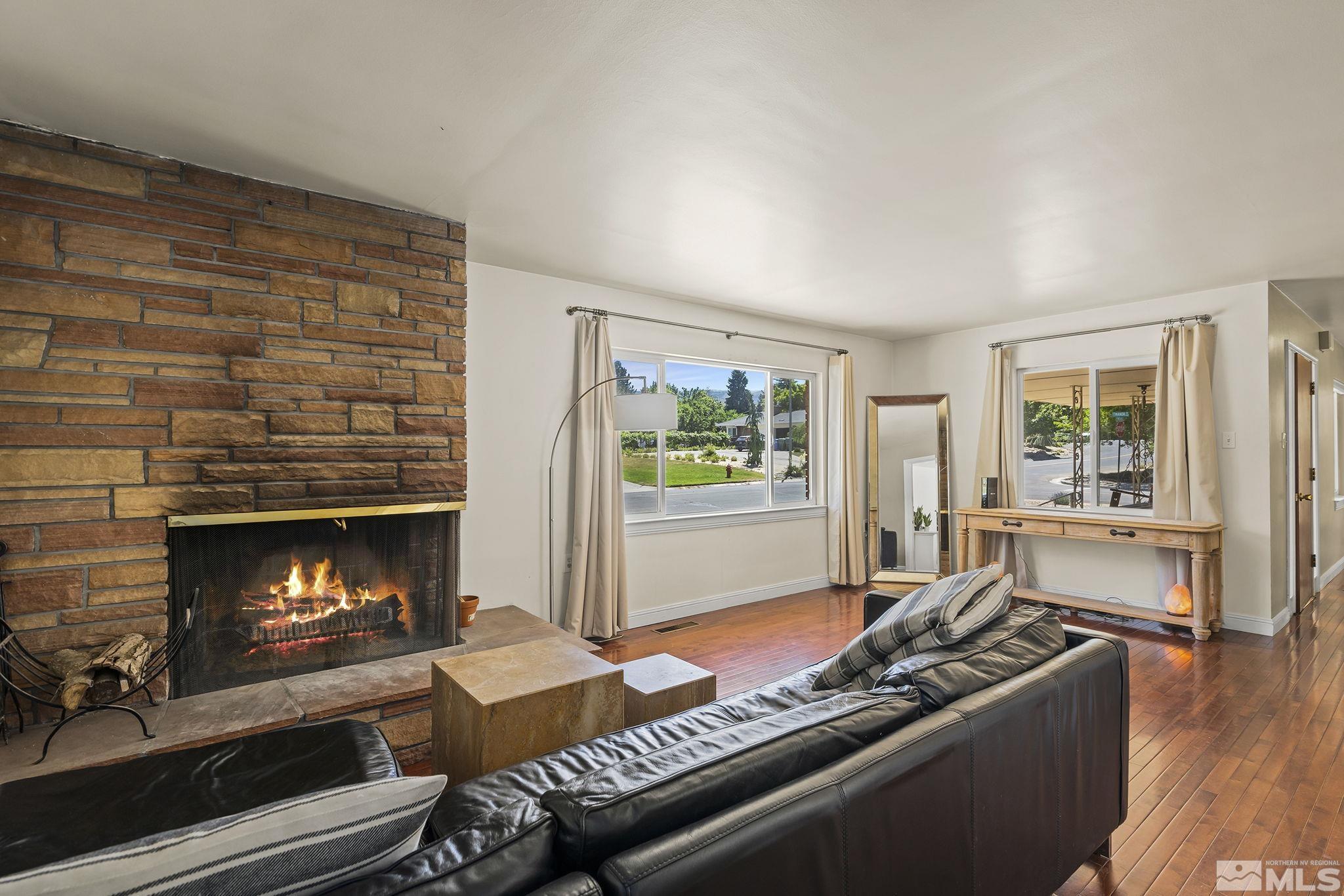 1165 Mt Rose Street Reno, NV 89509 - Photo 4 of 12 a living room with furniture and a fireplace