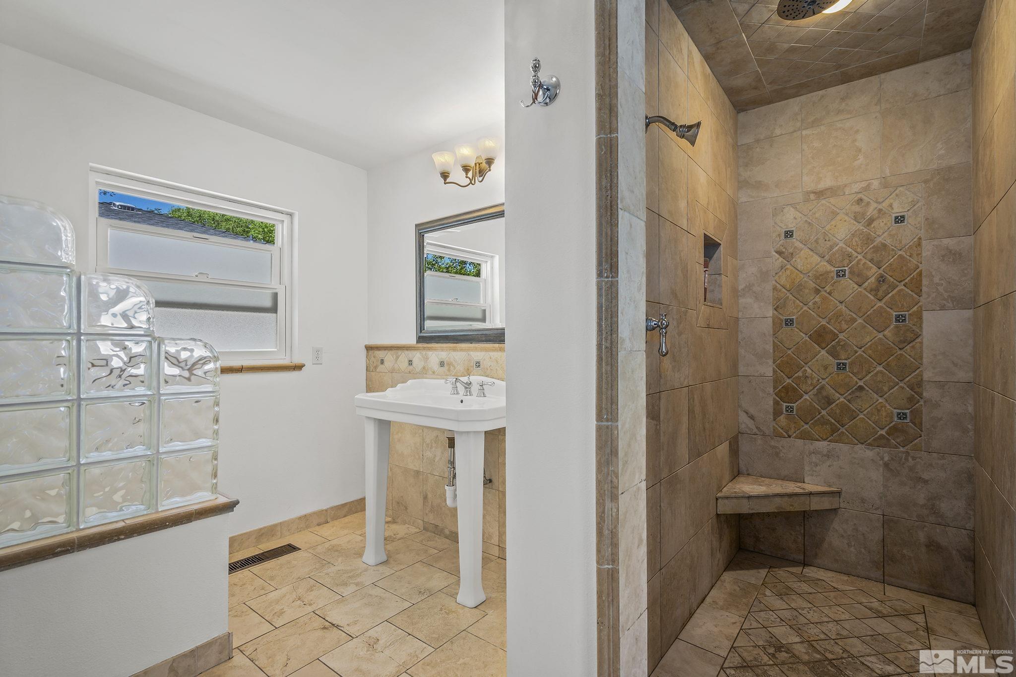 1165 Mt Rose Street Reno, NV 89509 - Photo 8 of 12 a bathroom with a toilet and a shower